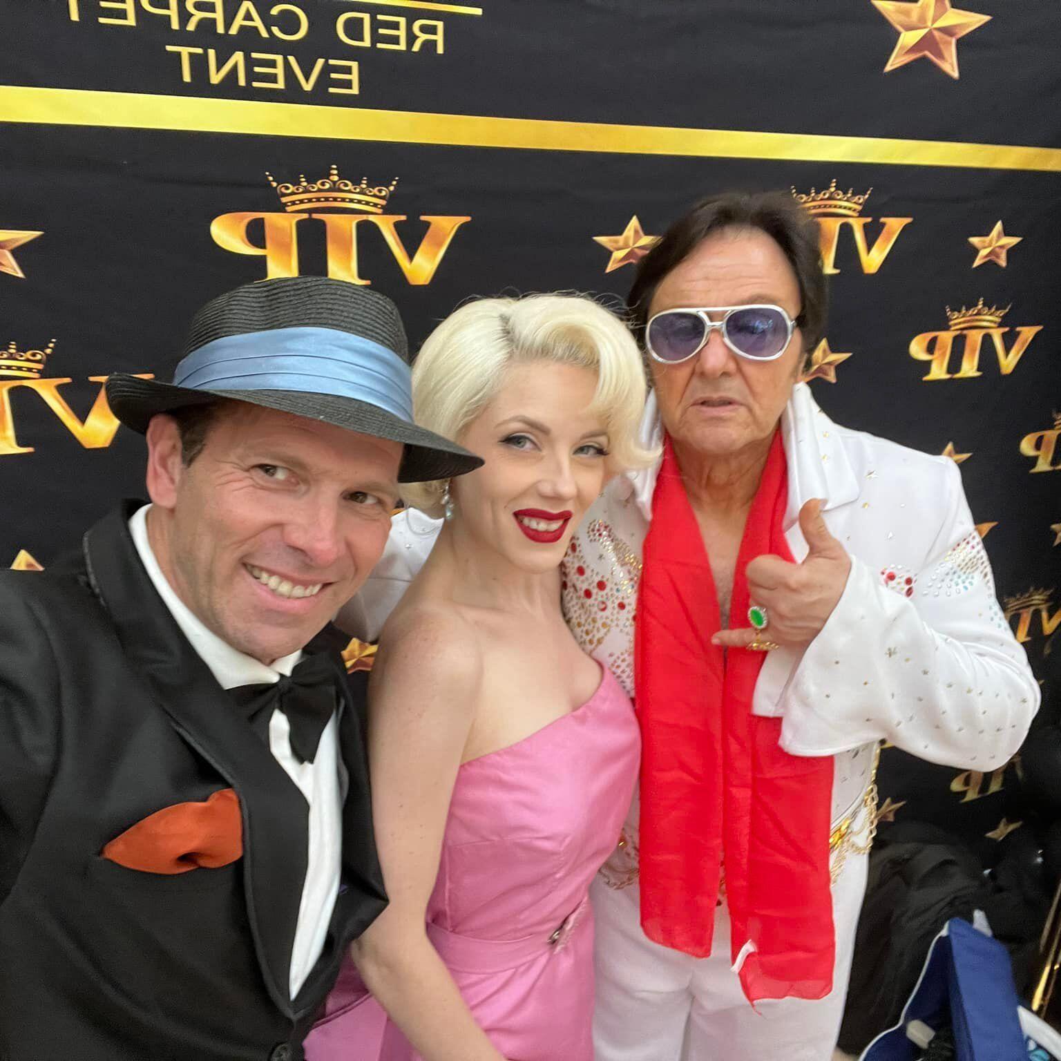 Paul Floriano doing an Elvis impersonation, with actors doing Marilyn Monroe and Frank Sinatra impersonations